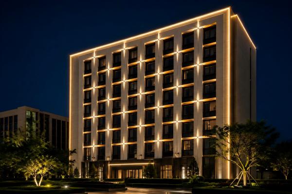 LED cross star light effect on a modern hotel facade